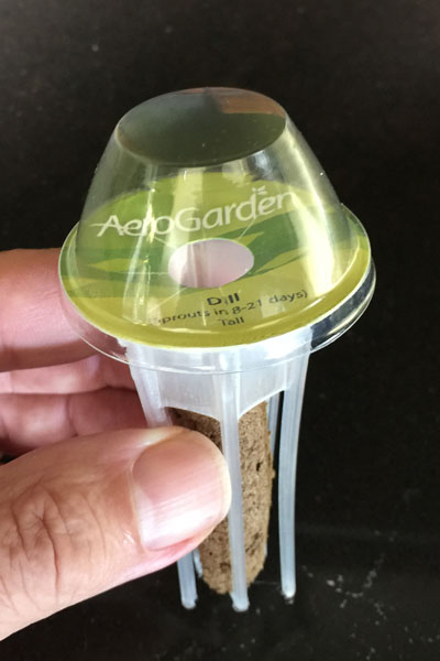 AeroGarden seed pod with dome
