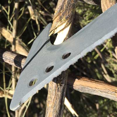 cutting branch with Fiskars Billhook