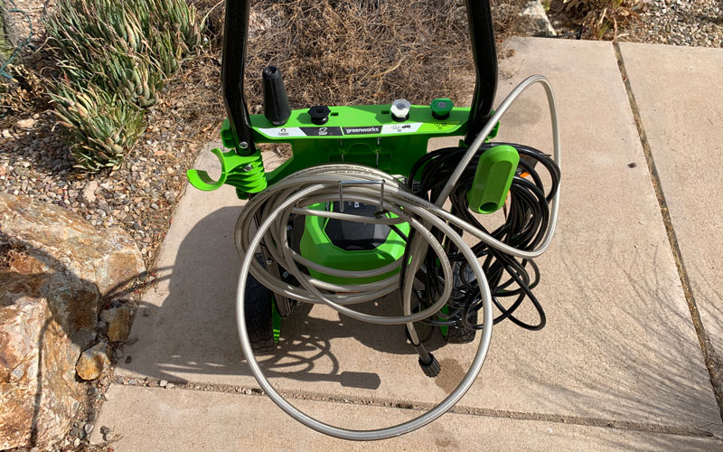 Greenworks-1800-PSI-Pressure-Washer-tangled-coil-on-machine
