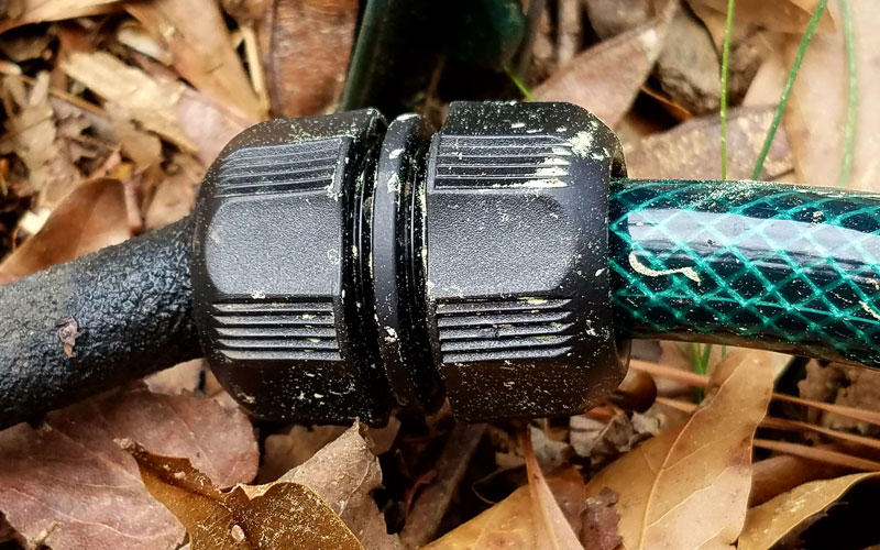 Snip-n-drip soaker hose connected to garden hose
