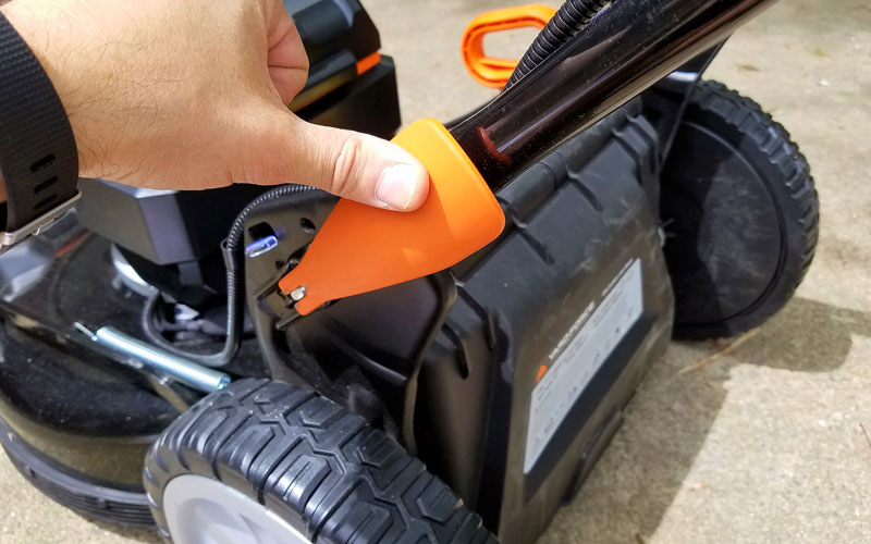 Yard Force 120V Cordless Mower securing fasteners on each side of the handle