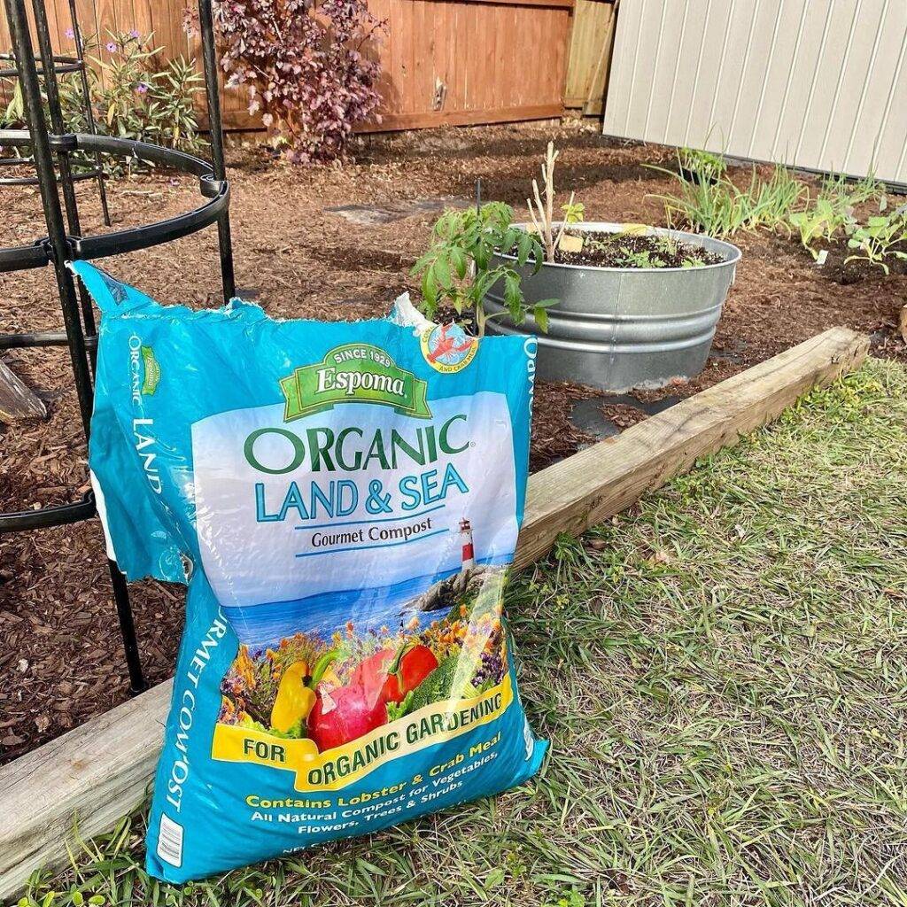 an open bag of organic land and sea gourmet compost by espoma